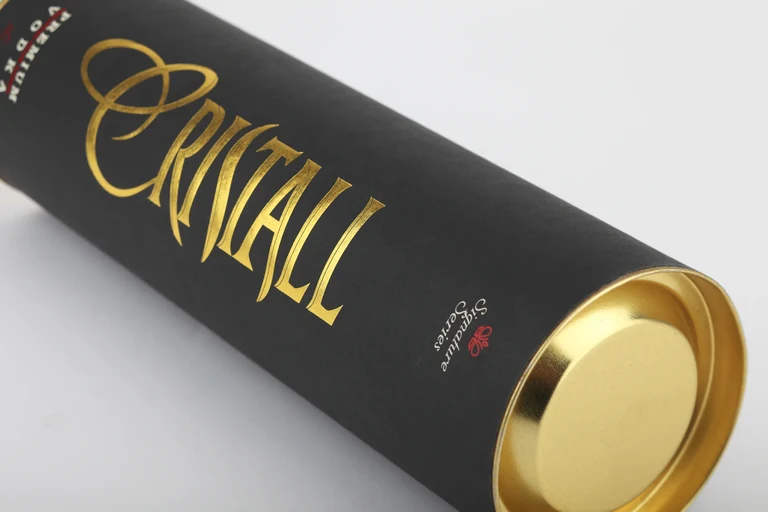 Cristall — Zylindrische Geschenkdosen · Detail eines metallischen Deckels